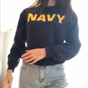 Navy blue crewneck with writing on front